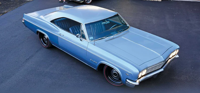 Light blue 1966 Chevrolet Impala SS photographed outdoors