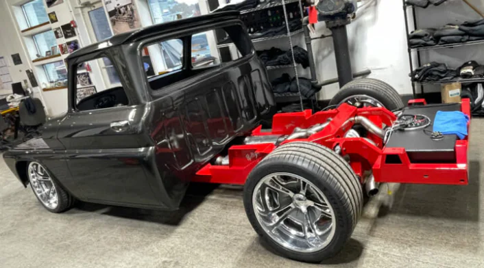 Rear chassis and independent suspension components installed beneath a classic truck body