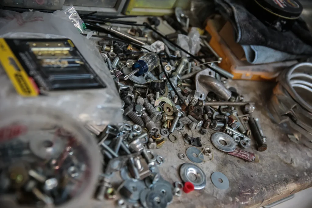 Mechanical components on a Chris Cerce Customs workbench