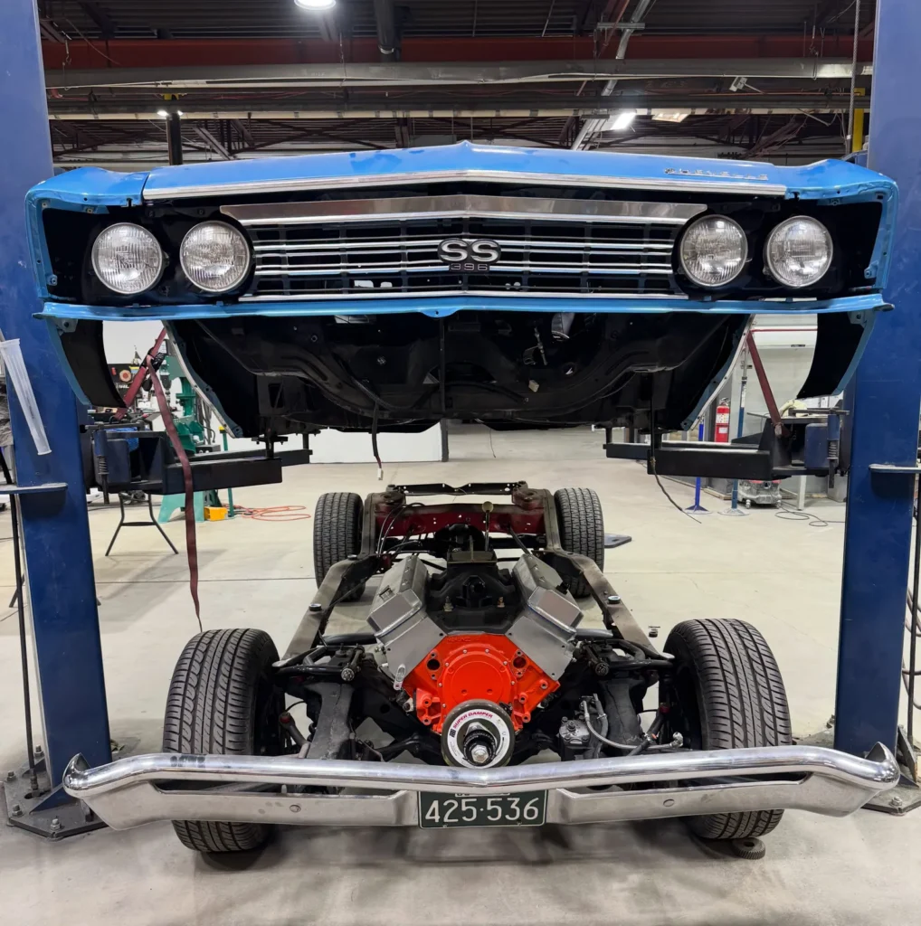 Mark’s blue 1967 Chevelle body lifted above its original chassis