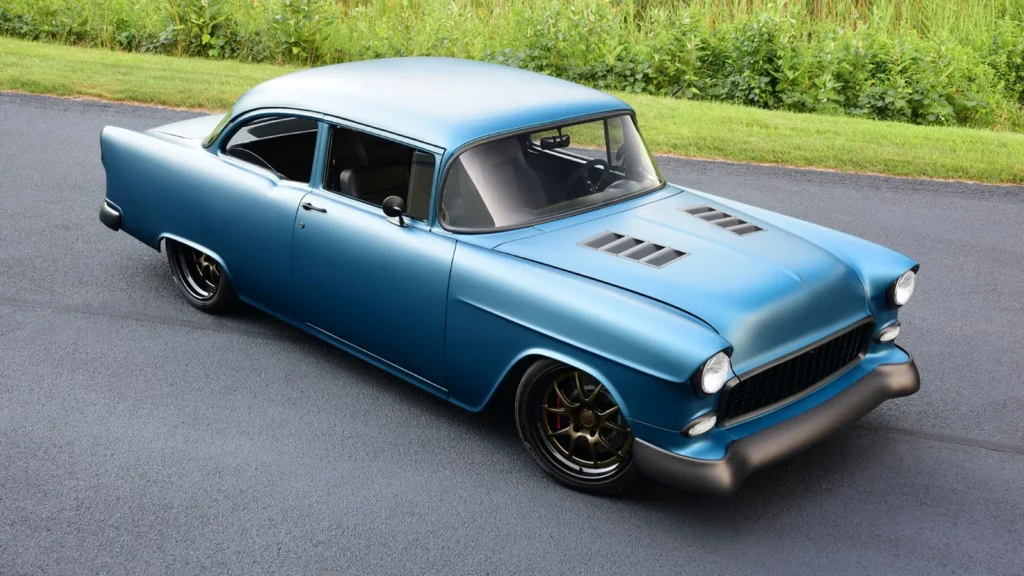High front three-quarter view of the blue 1955 Chevrolet 150