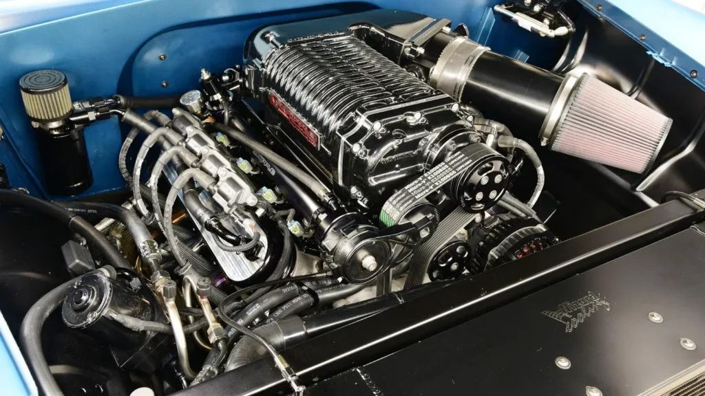 Don Hardy engine installed in the blue 1955 Chevrolet 150