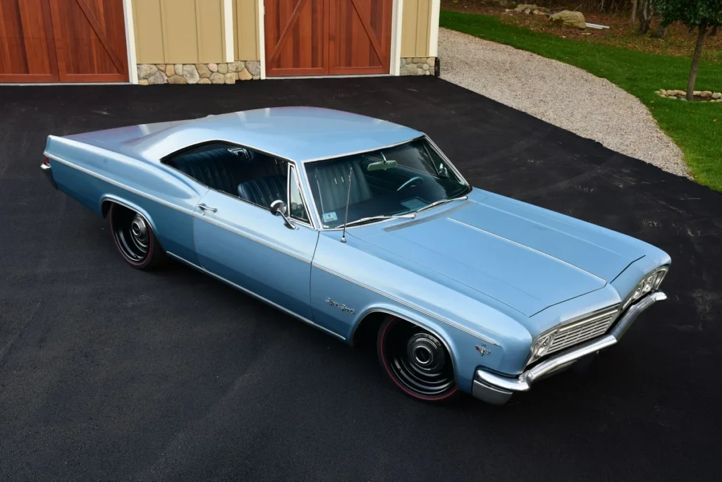 1966 Chevrolet Impala SS with its low stance and blue finish