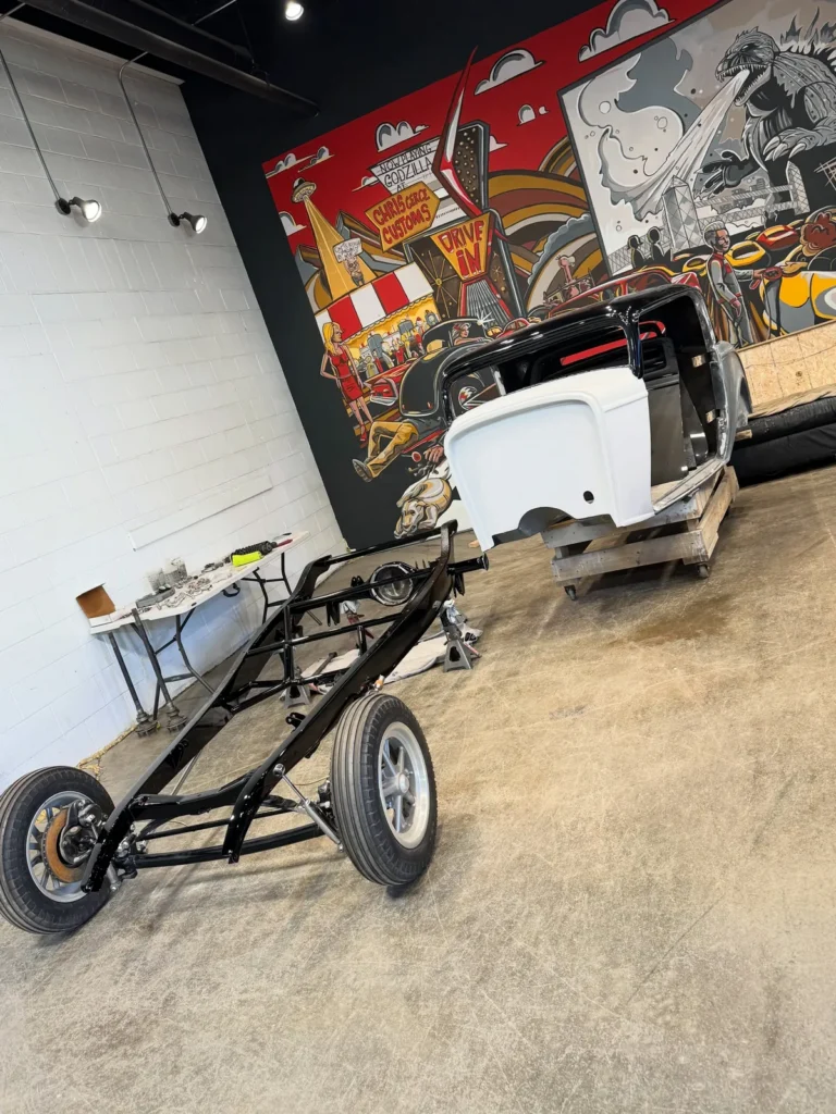 Chris Cerce’s coupe chassis being rebuilt inside the current workshop