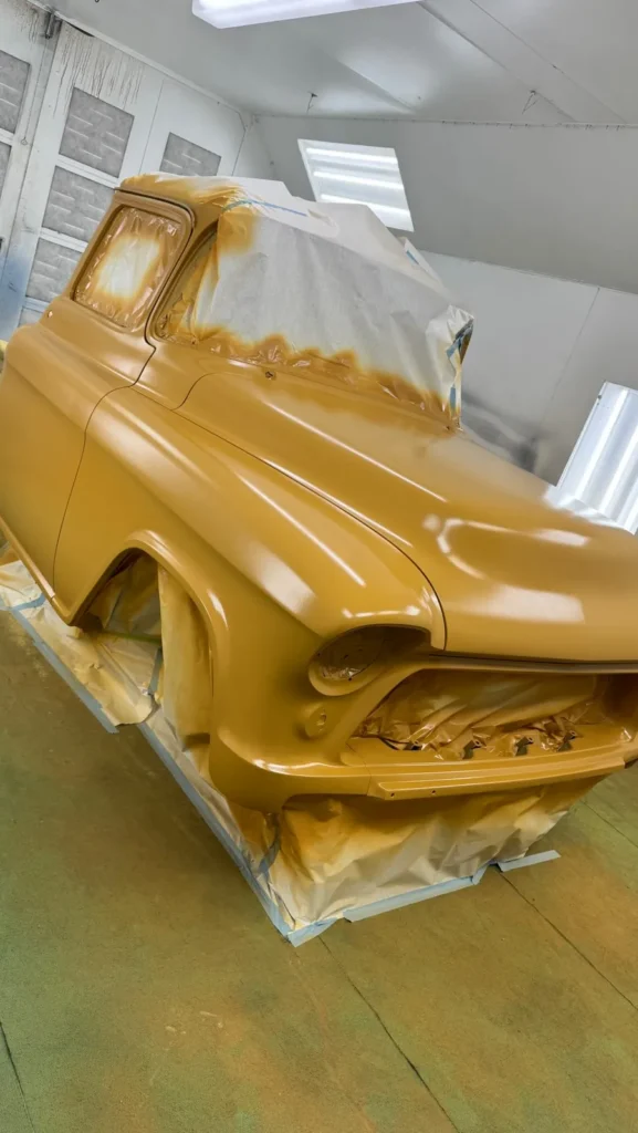 1956 Chevrolet pickup in the paint booth after polyester primer